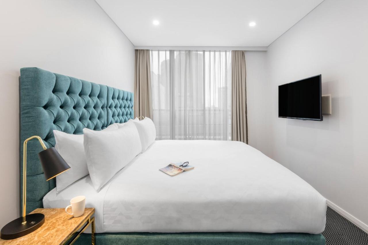Meriton Suites Pitt Street, Sydney Zewnętrze zdjęcie A bedroom at the hotel