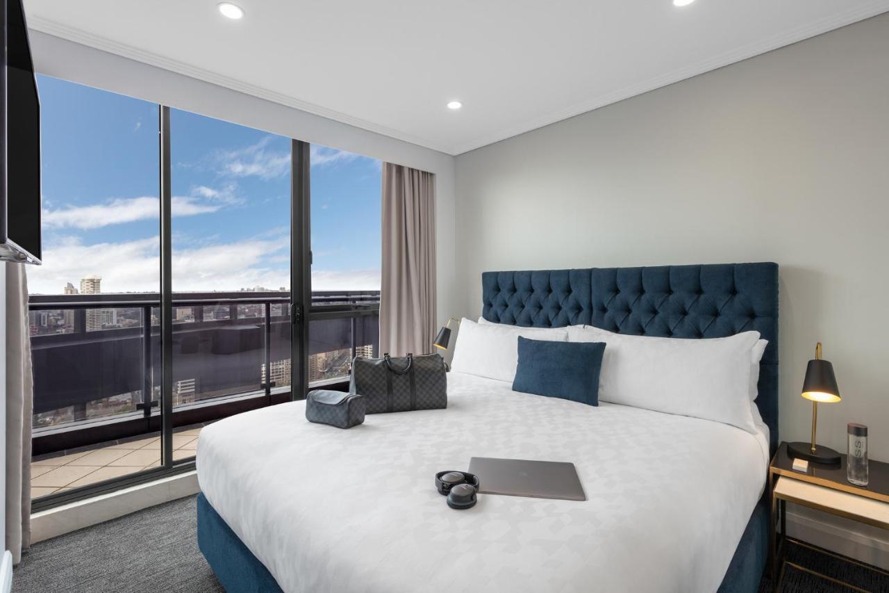 Meriton Suites Pitt Street, Sydney Zewnętrze zdjęcie A bedroom at the hotel
