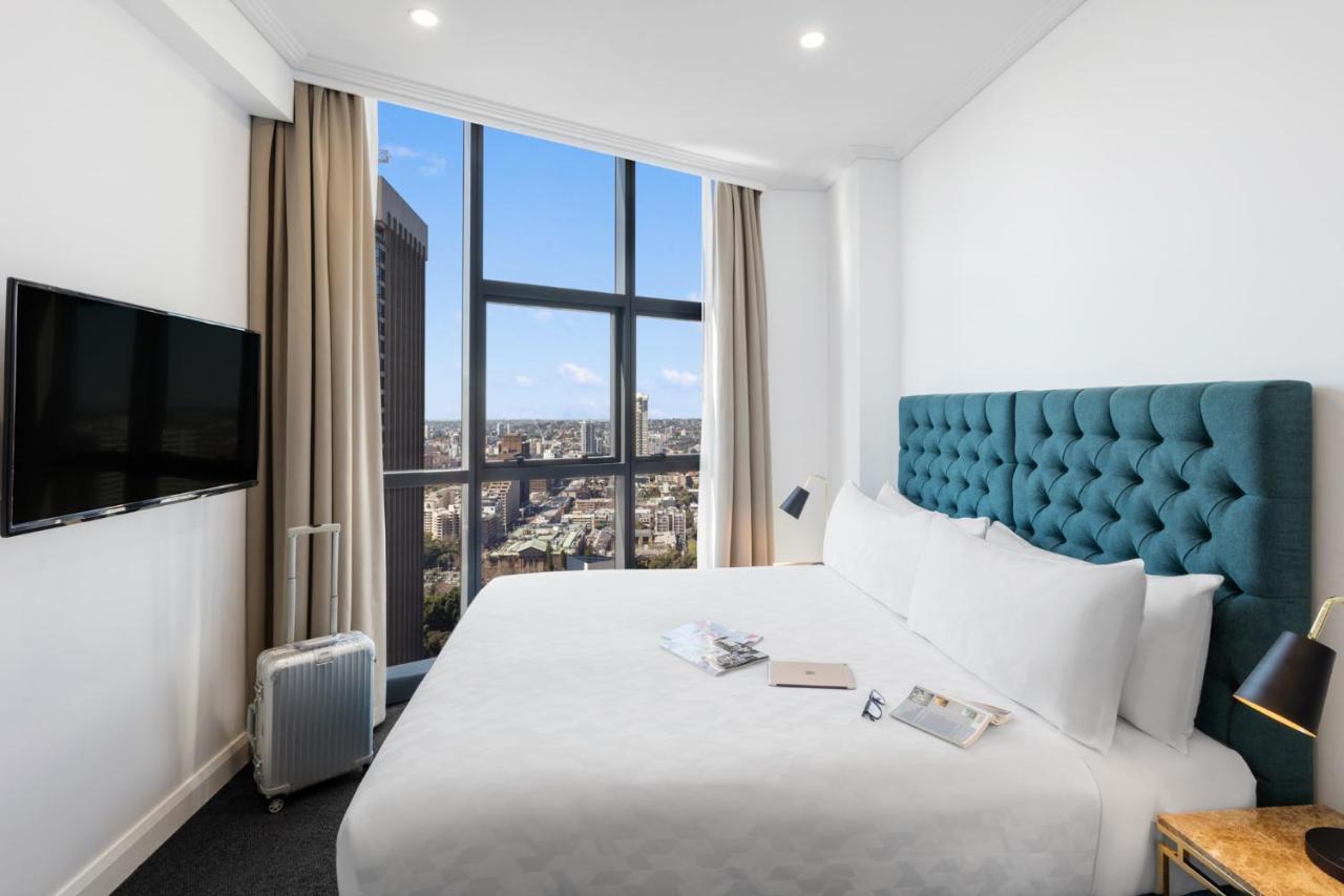 Meriton Suites Pitt Street, Sydney Zewnętrze zdjęcie A bedroom at the hotel