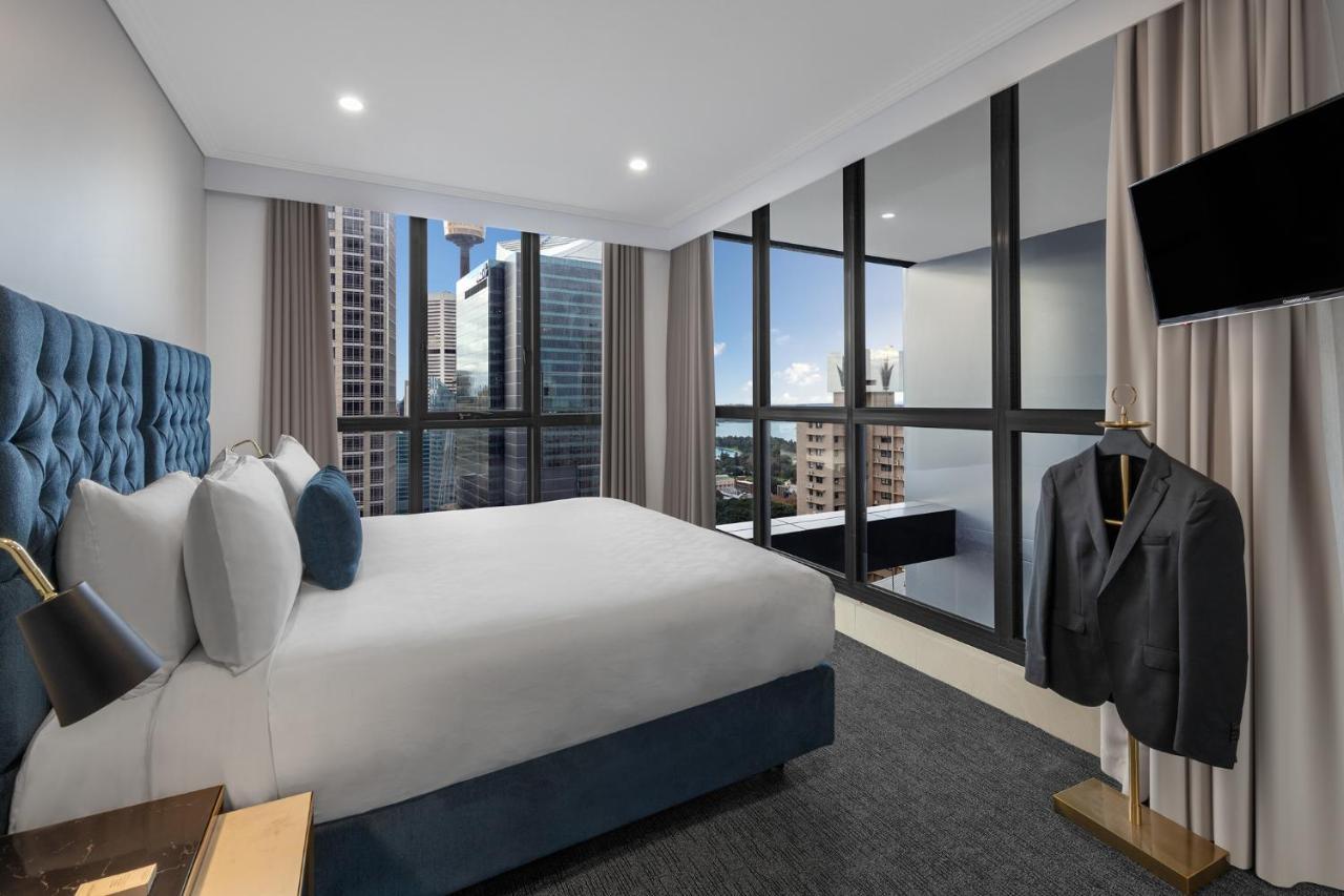 Meriton Suites Pitt Street, Sydney Zewnętrze zdjęcie A bedroom at the hotel